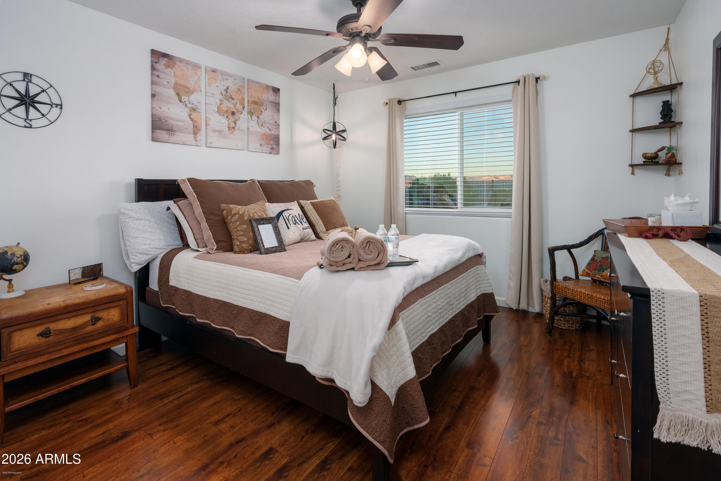 4550 Hopewell Mine Road Clarkdale, AZ 86324 - Photo 40 of 97 a bedroom with bed and wooden floor
