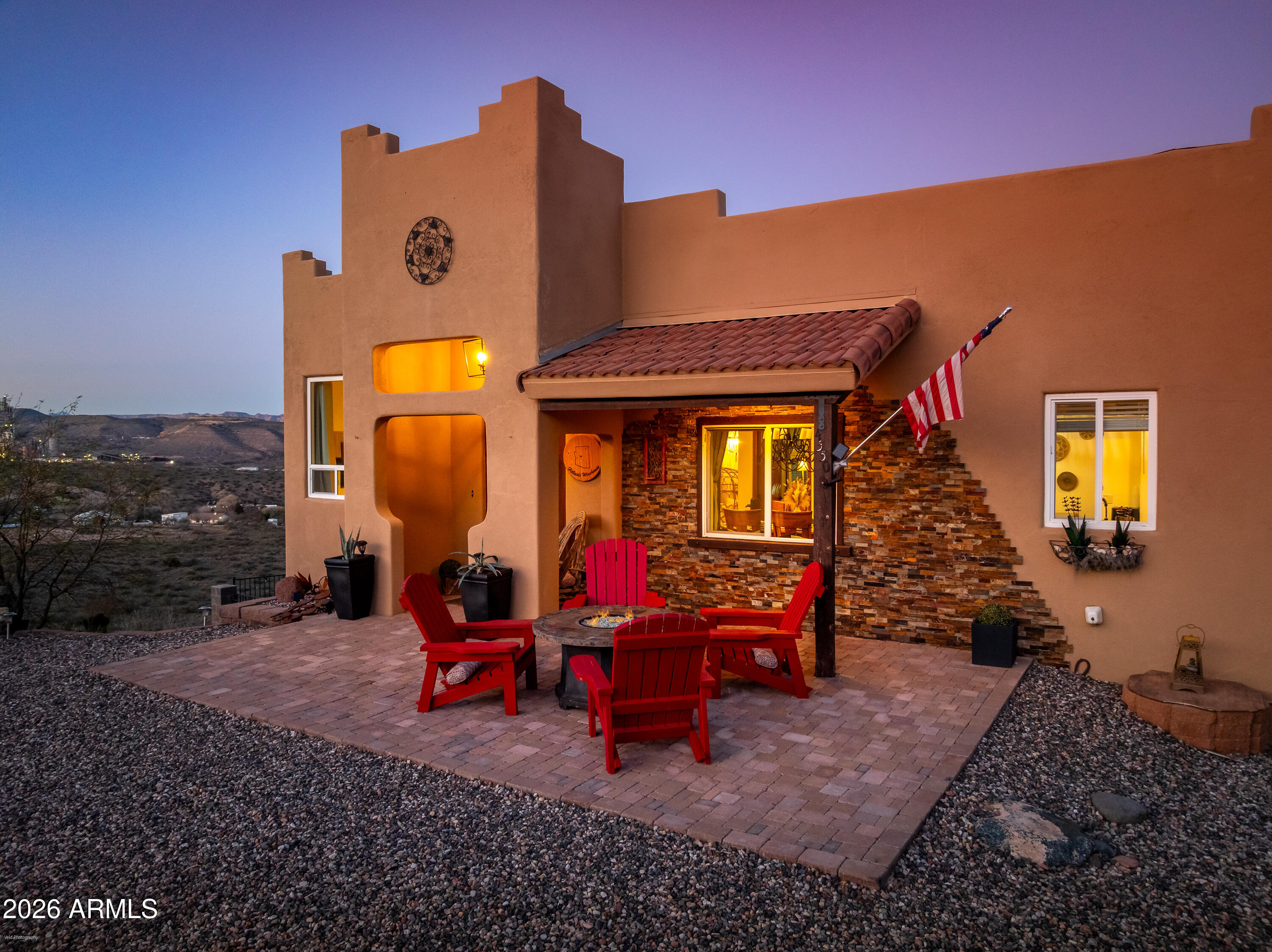 4550 Hopewell Mine Road Clarkdale, AZ 86324 - Photo 6 of 97 a backyard of a house with barbeque oven table and chairs