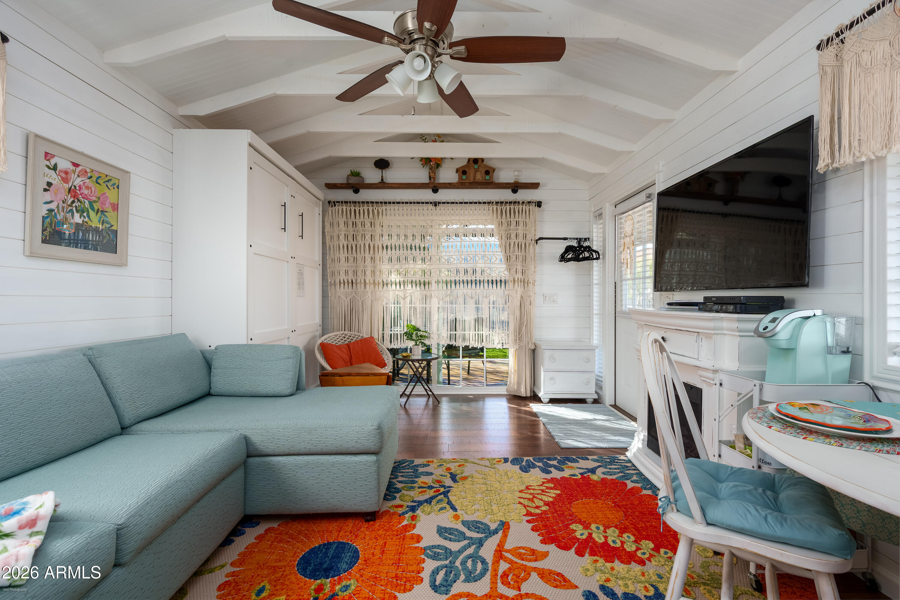 4550 Hopewell Mine Road Clarkdale, AZ 86324 - Photo 75 of 97 a living room with furniture and a flat screen tv