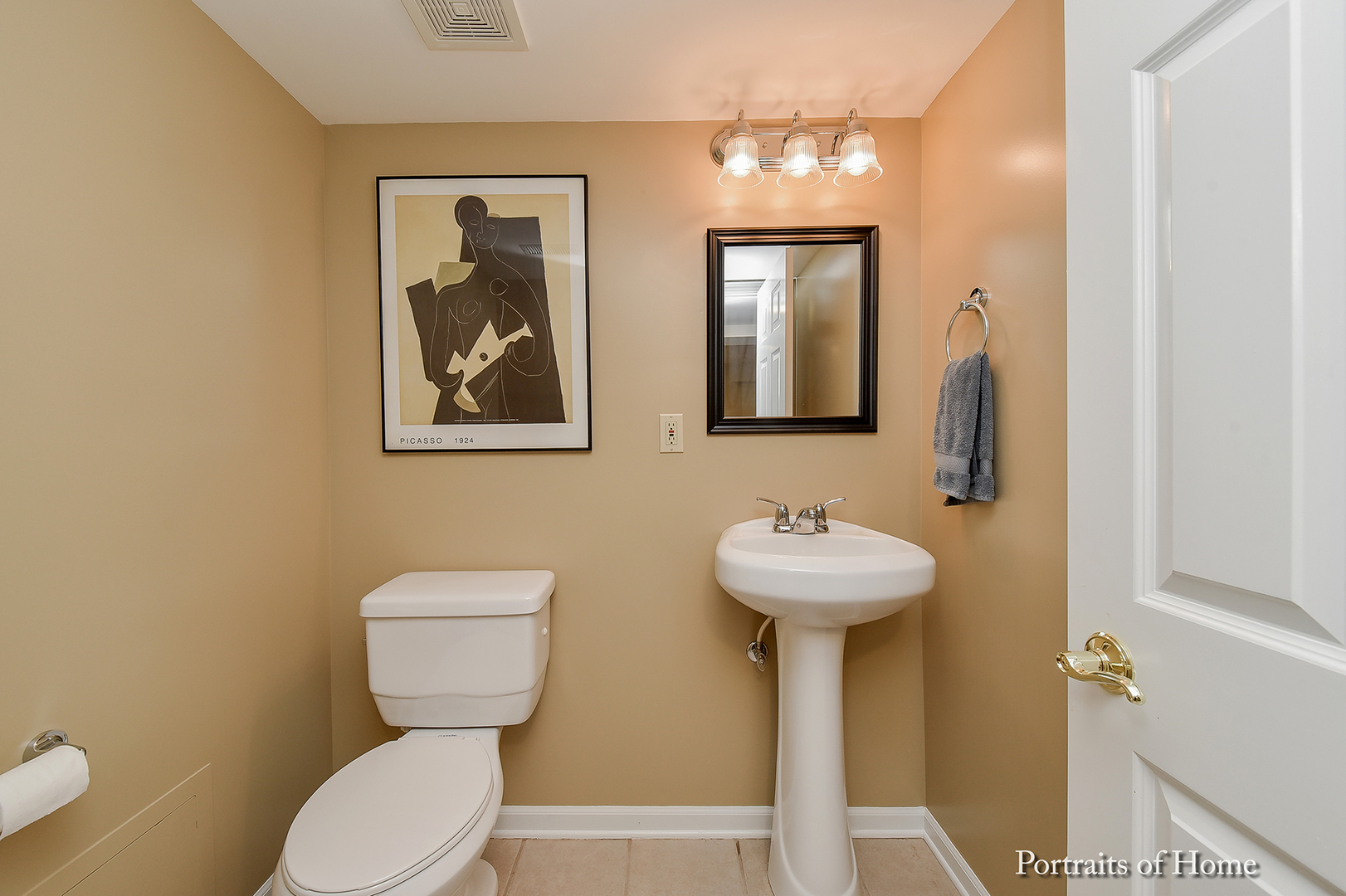 39W145 Baert Road St. Charles, IL 60175 - Photo 22 of 32 a bathroom with a toilet sink and mirror