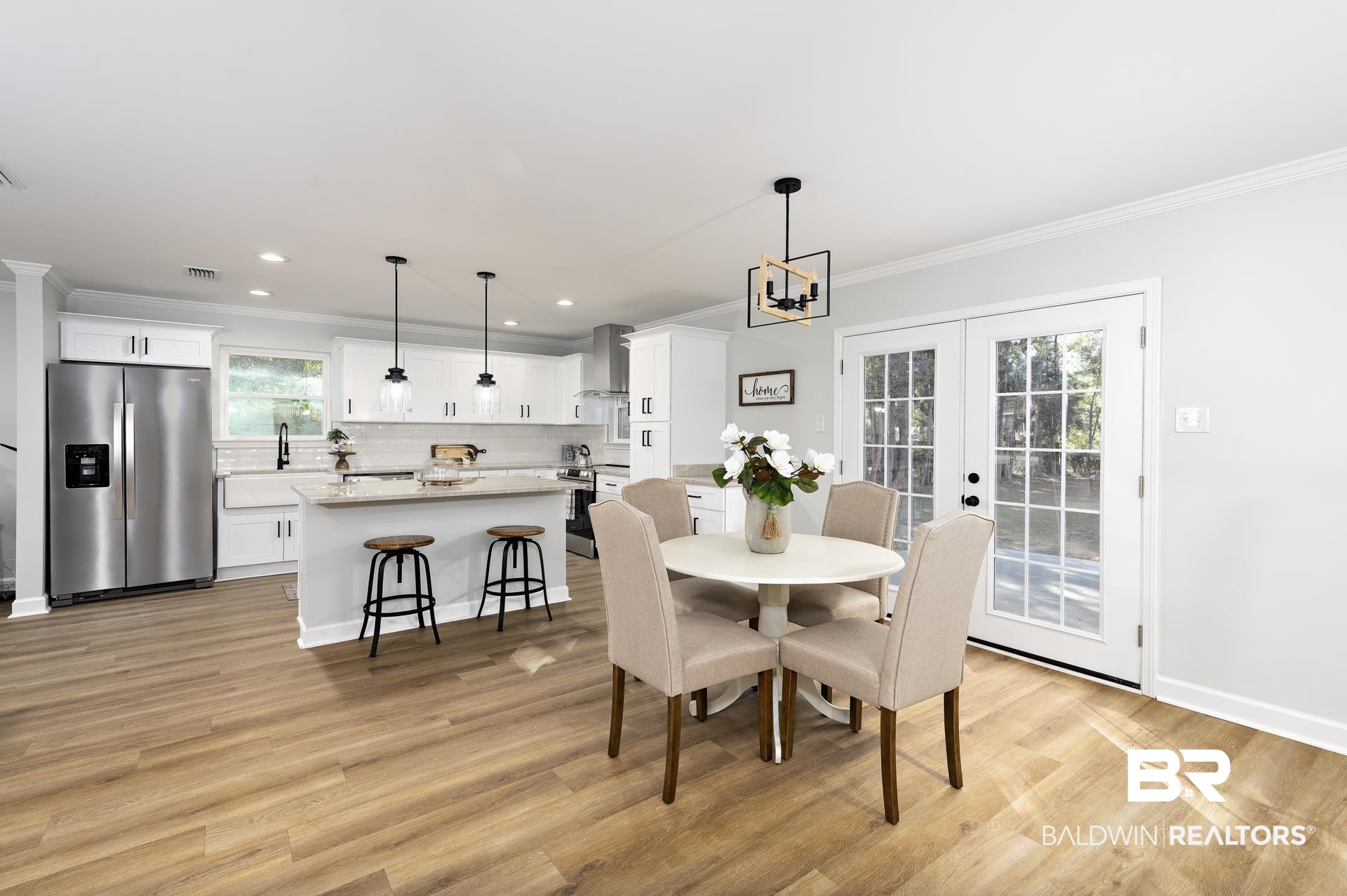 6001 Camp Halls Mill Road Mobile, AL 36619 - Photo 3 of 52 Dining room featuring ornamental molding, light wood-type flooring, a chandelier, recessed lighting, and french doors