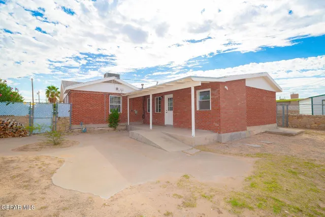 a house view with a garden space