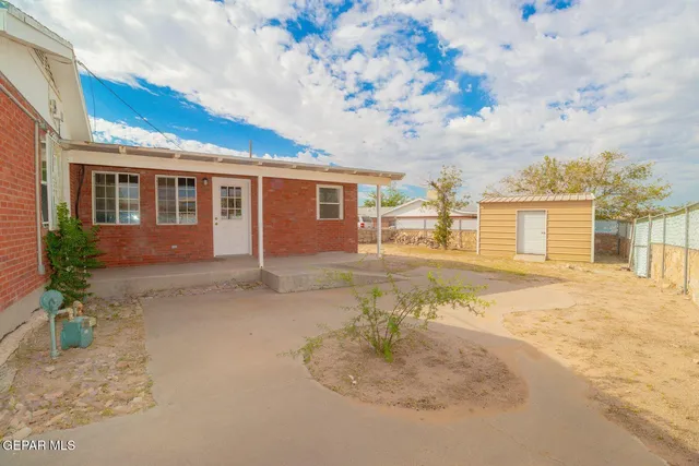 a view of backyard of house