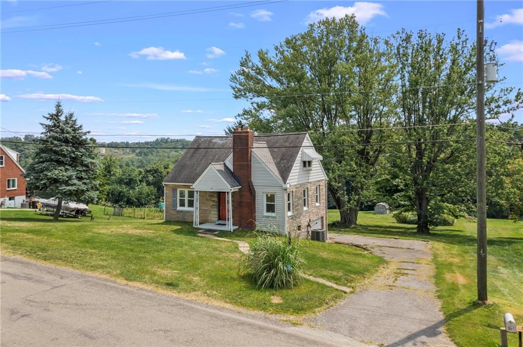 34 Meyers Road Washington, PA 15301 - Photo 2 of 34 a front view of a house with garden