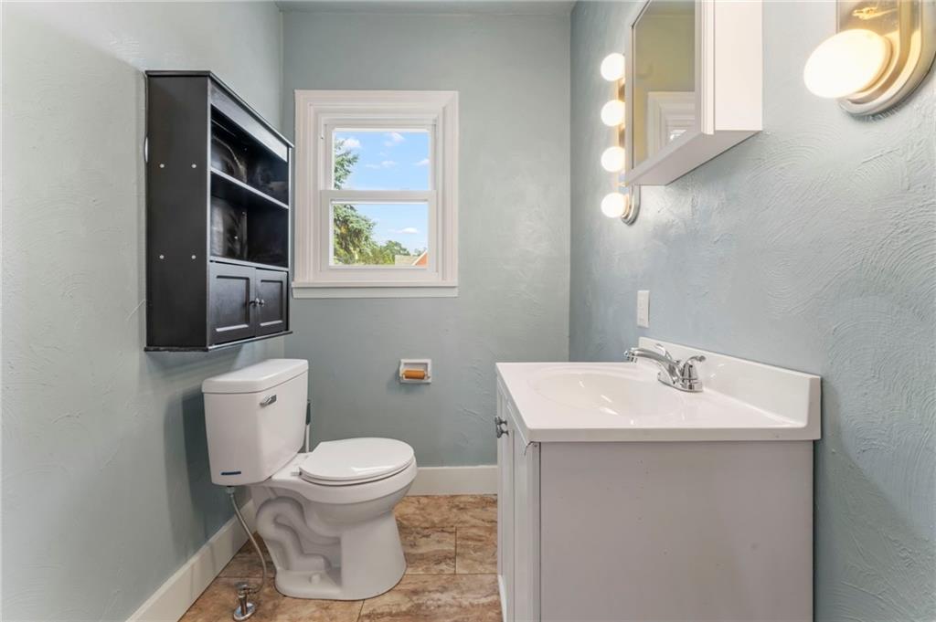 34 Meyers Road Washington, PA 15301 - Photo 26 of 34 a bathroom with a toilet sink and mirror
