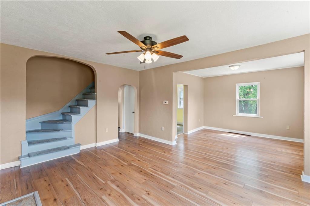 34 Meyers Road Washington, PA 15301 - Photo 9 of 34 a view of an empty room with wooden floor and a window