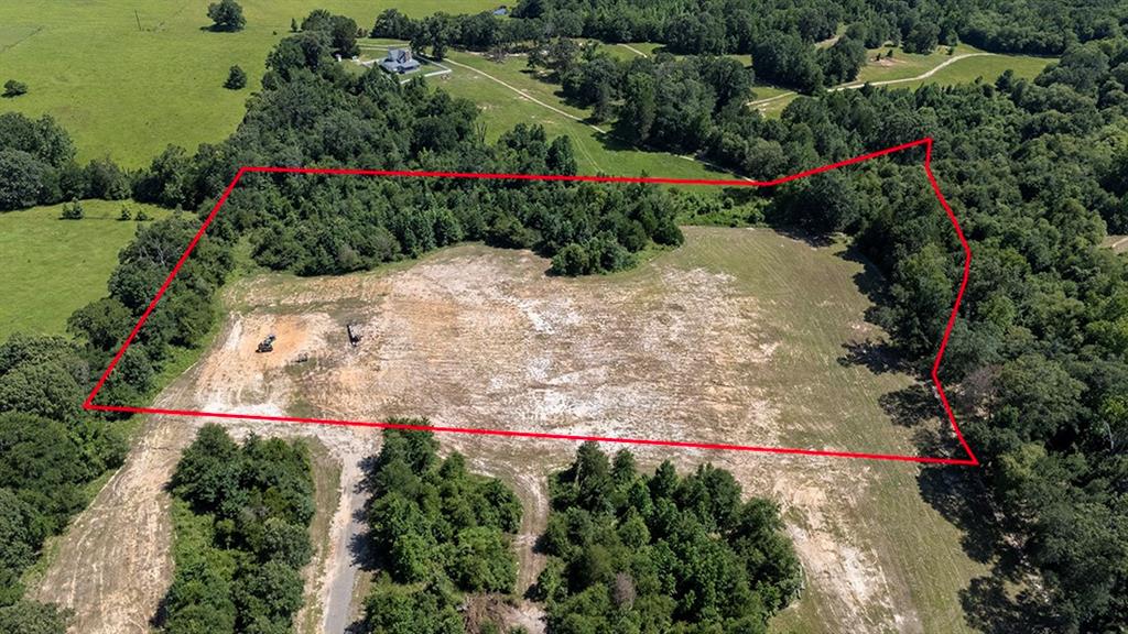 Tbd Lot 79 R Tbd Drive Murchison, TX 75778 - Photo 2 of 4 a view of a garden with flowers