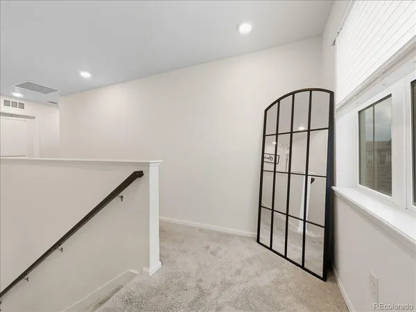 wooden floor with staircase