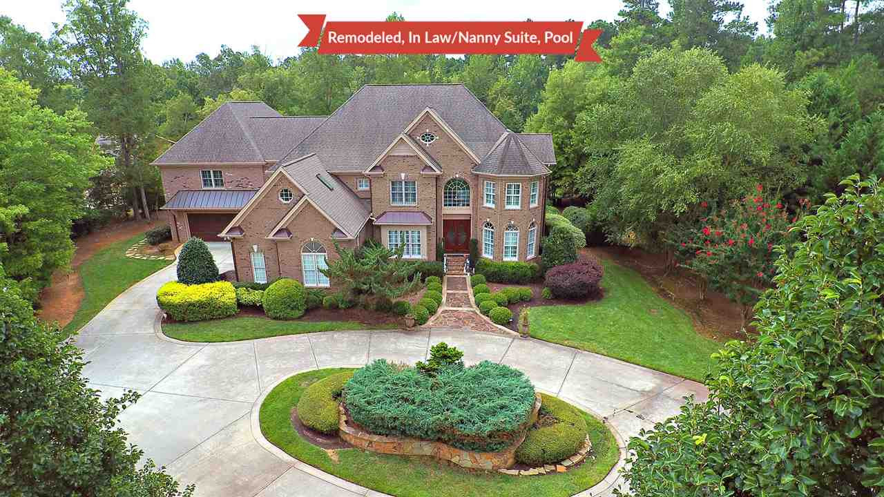 1608 Sharnbrook Court Raleigh, NC 27614 - Photo 3 of 30 All brick private estate, no city taxes, centrally located to shopping & highways. Meticulously manicured yard with privacy, putting range, salt water pool, and outdoor entertaining-can fit large groups Facade/Exterior Front