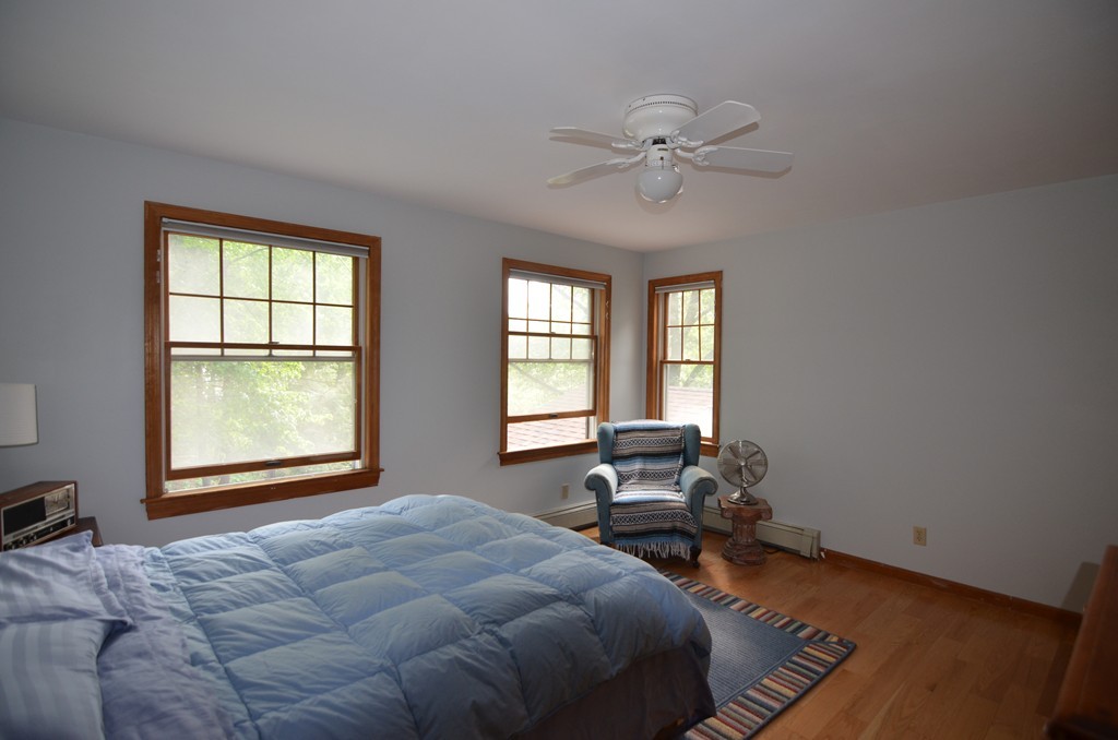 17 Oak Hill Road Harvard, MA 01451 - Photo 15 of 28 a bed room with a bed and windows