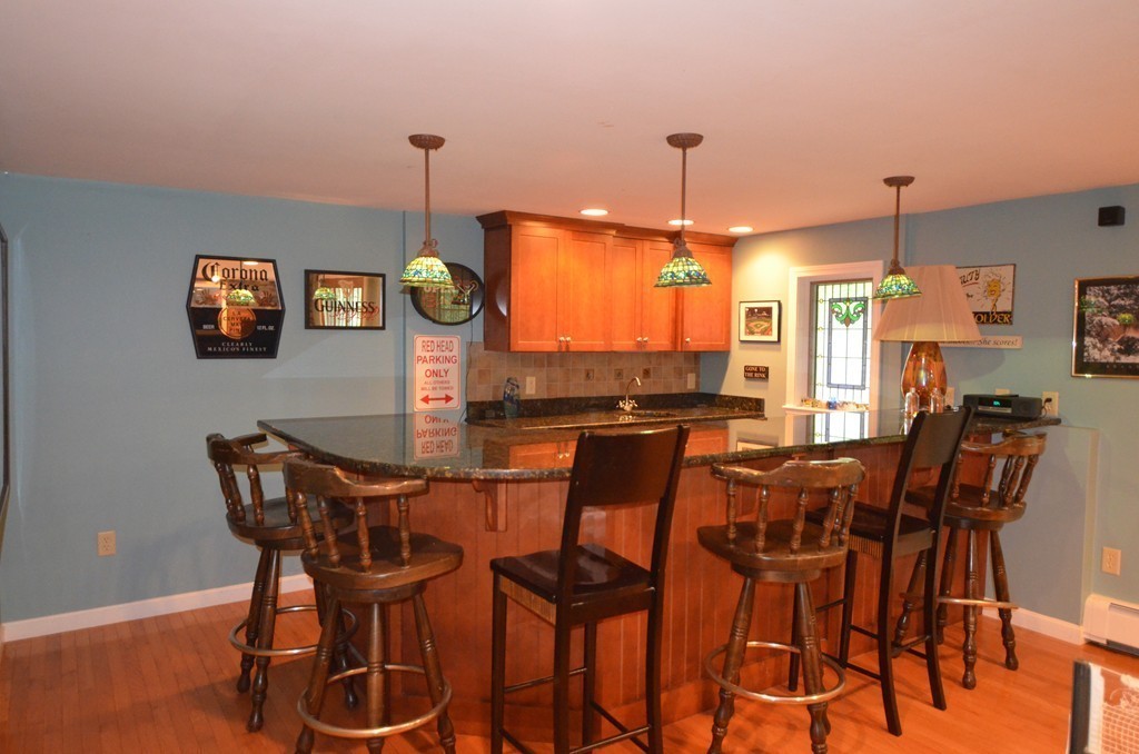 17 Oak Hill Road Harvard, MA 01451 - Photo 21 of 28 a view of a dining room with furniture window and wooden floor