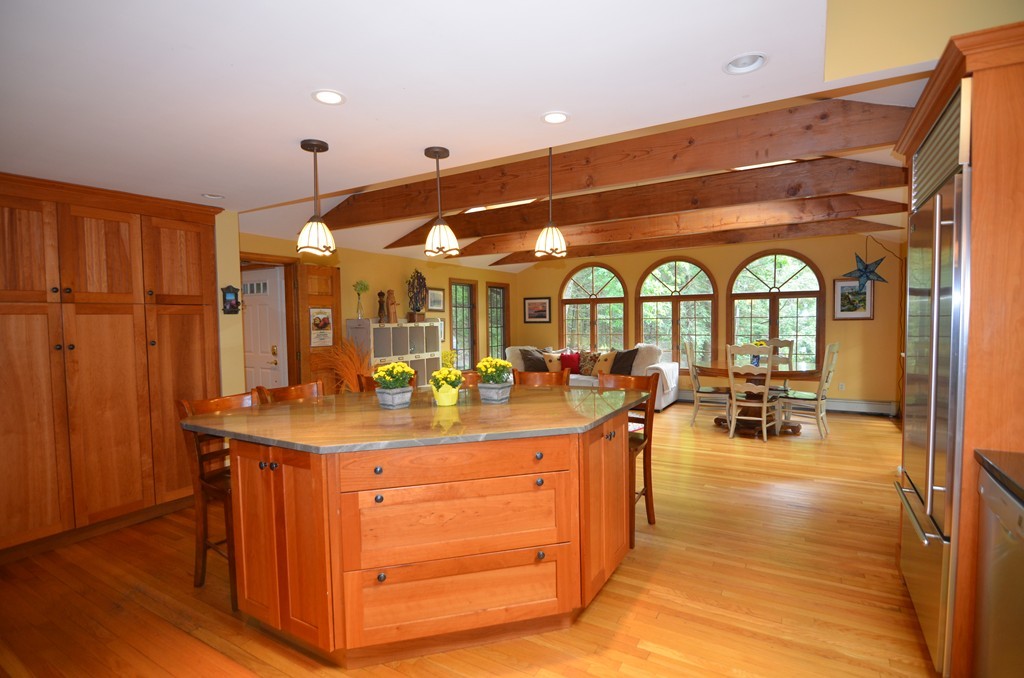 17 Oak Hill Road Harvard, MA 01451 - Photo 7 of 28 a view of a living room and hall with kitchen view