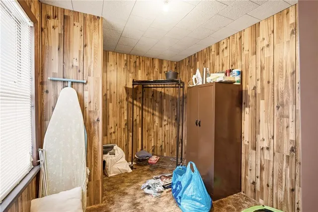 a view of walk in closet with large window