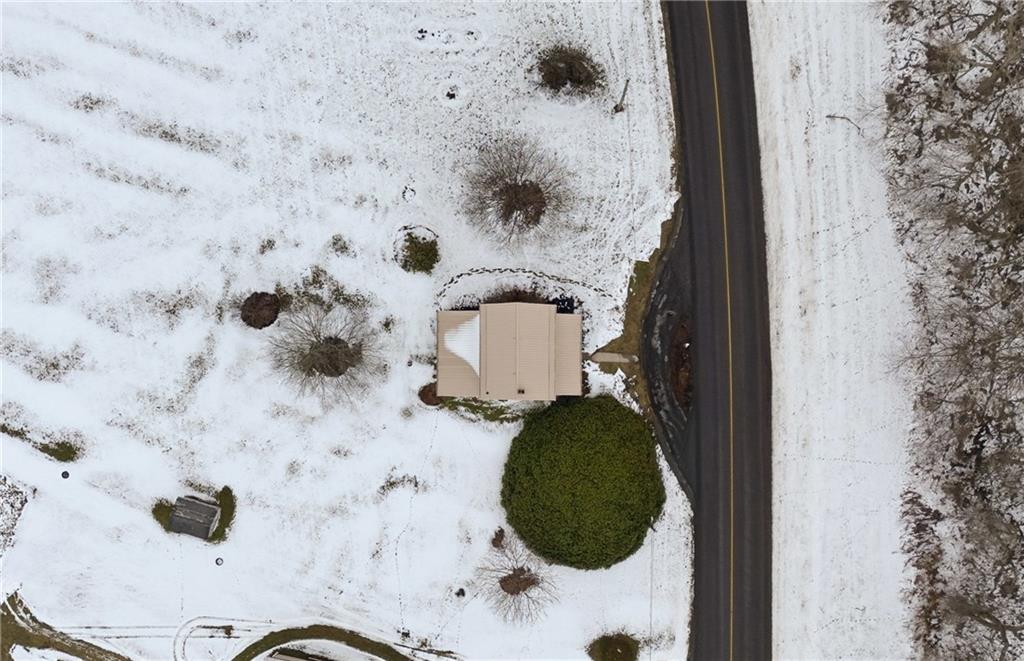 202 Sechler Road Friedens, PA 15541 - Photo 24 of 31 a aerial view of a fireplace with wooden floor