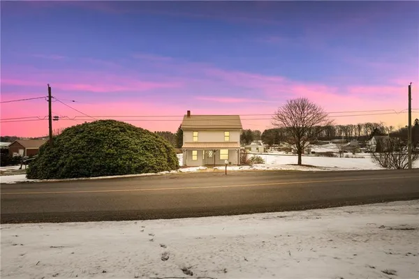 a view of a street with houses