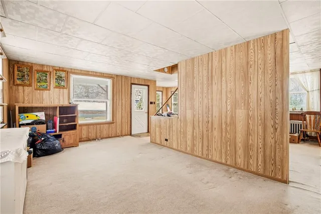 a view of a room with large windows