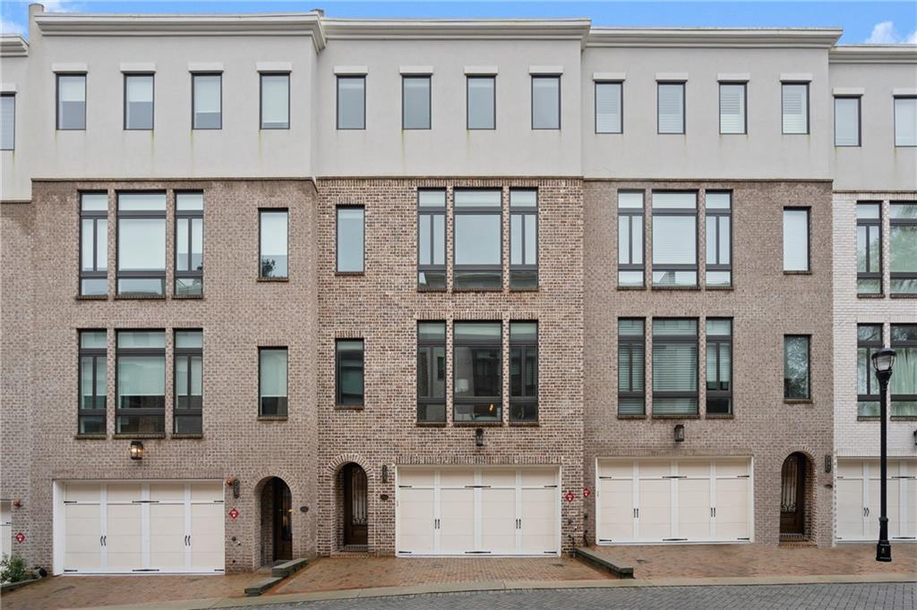733 Lenox Lane Atlanta, GA 30324 - Photo 1 of 1 a front view of a building with large windows