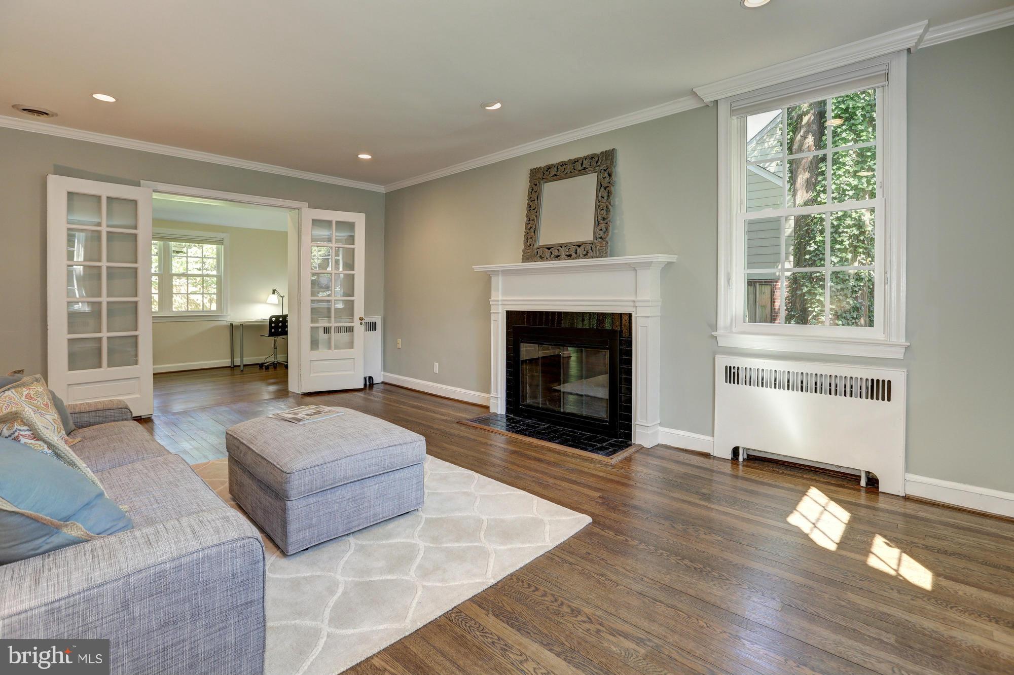 5304 Wriley Road Bethesda, MD 20816 - Photo 6 of 30 Living Room with Crown Moulding and Gas Fireplace