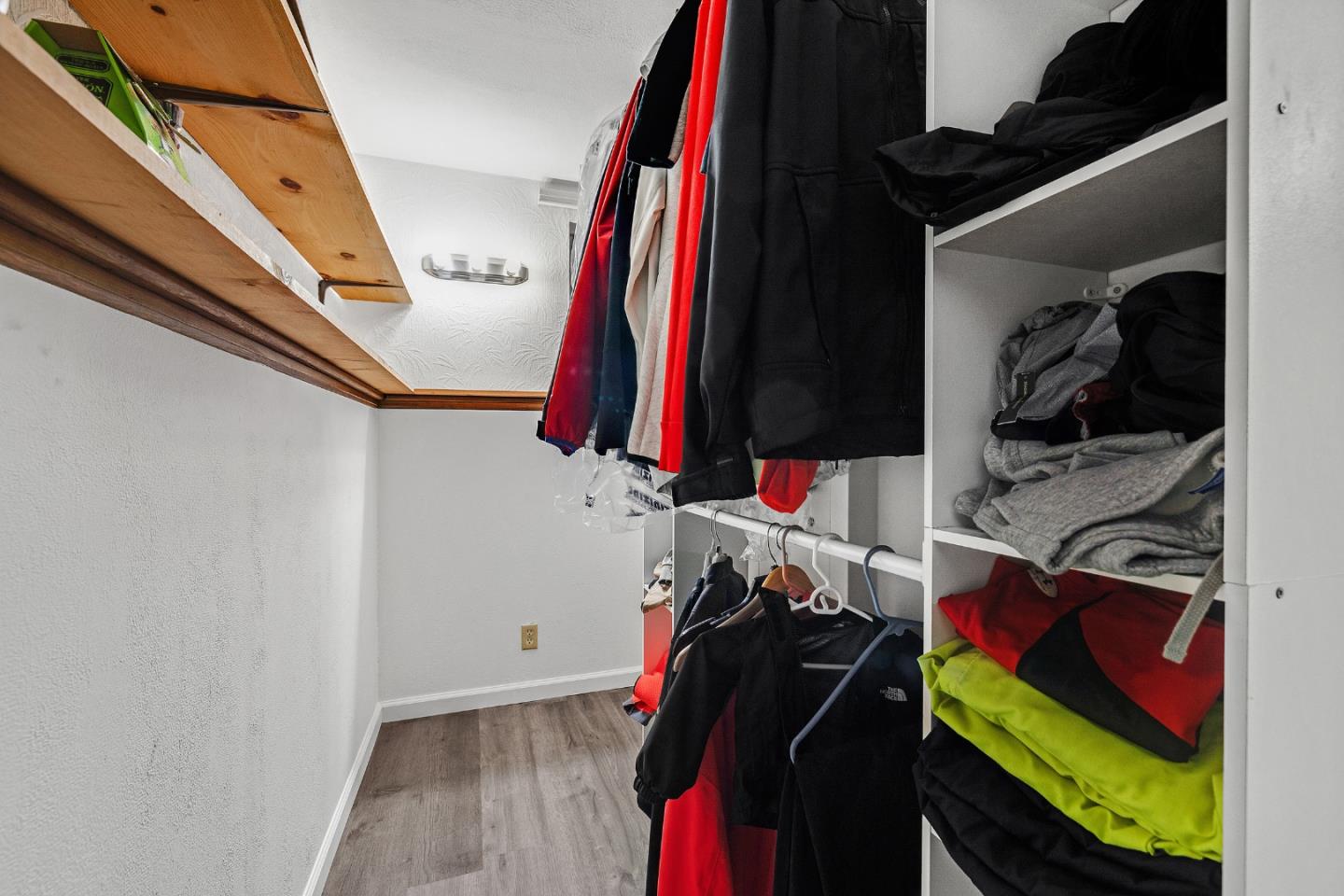 19 Elk Court Pacifica, CA 94044 - Photo 30 of 45 a view of walk in closet with clothes and shoes