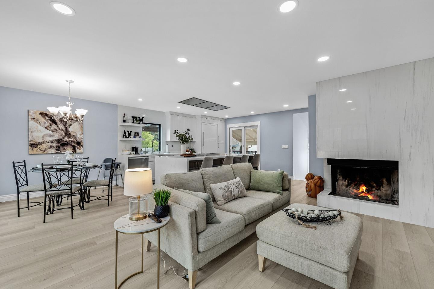 19 Elk Court Pacifica, CA 94044 - Photo 7 of 45 a living room with furniture and a fireplace