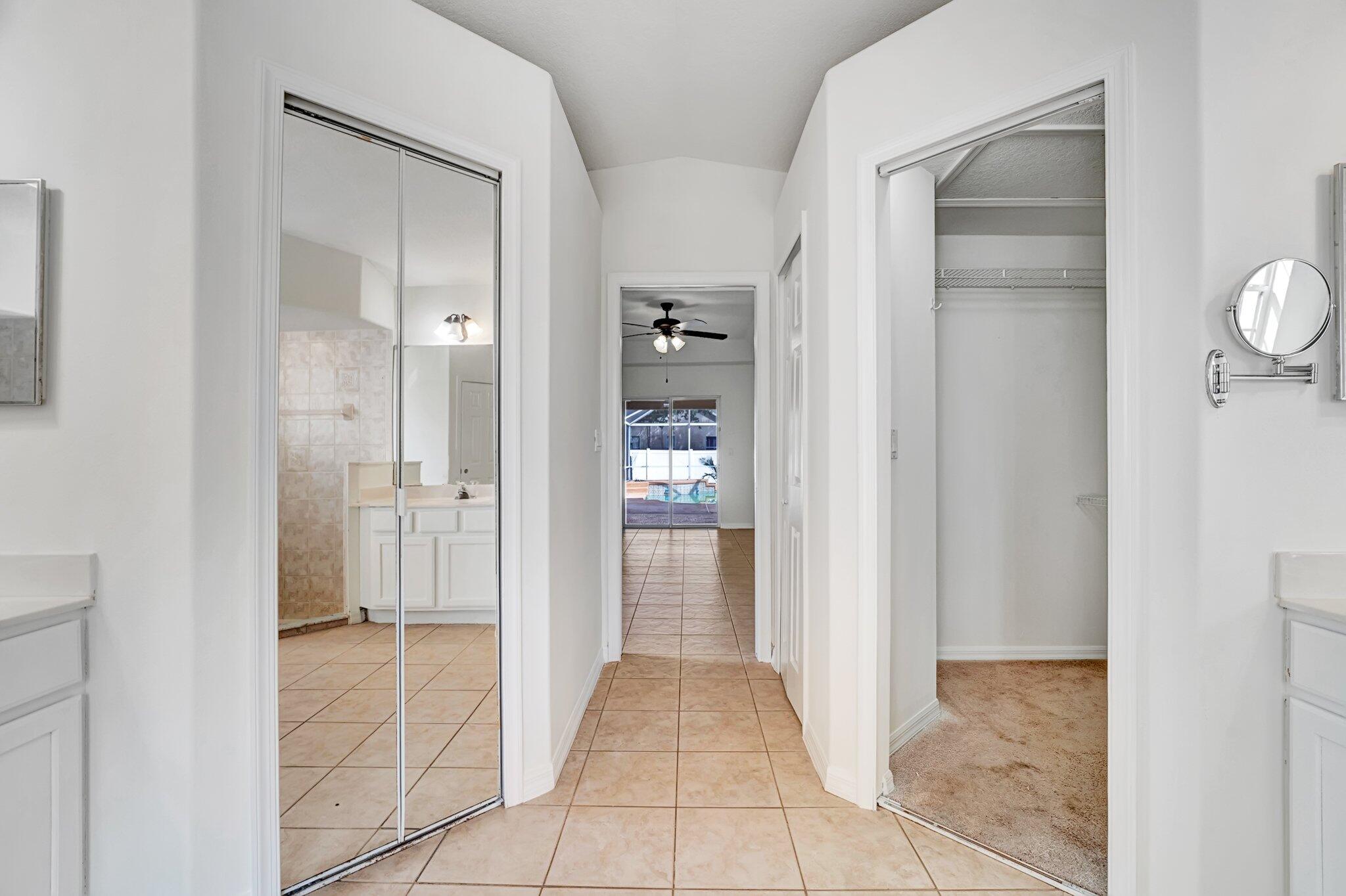 513 Southeast Cliff Road Port St. Lucie, FL 34984 - Photo 23 of 39 a view of a hallway