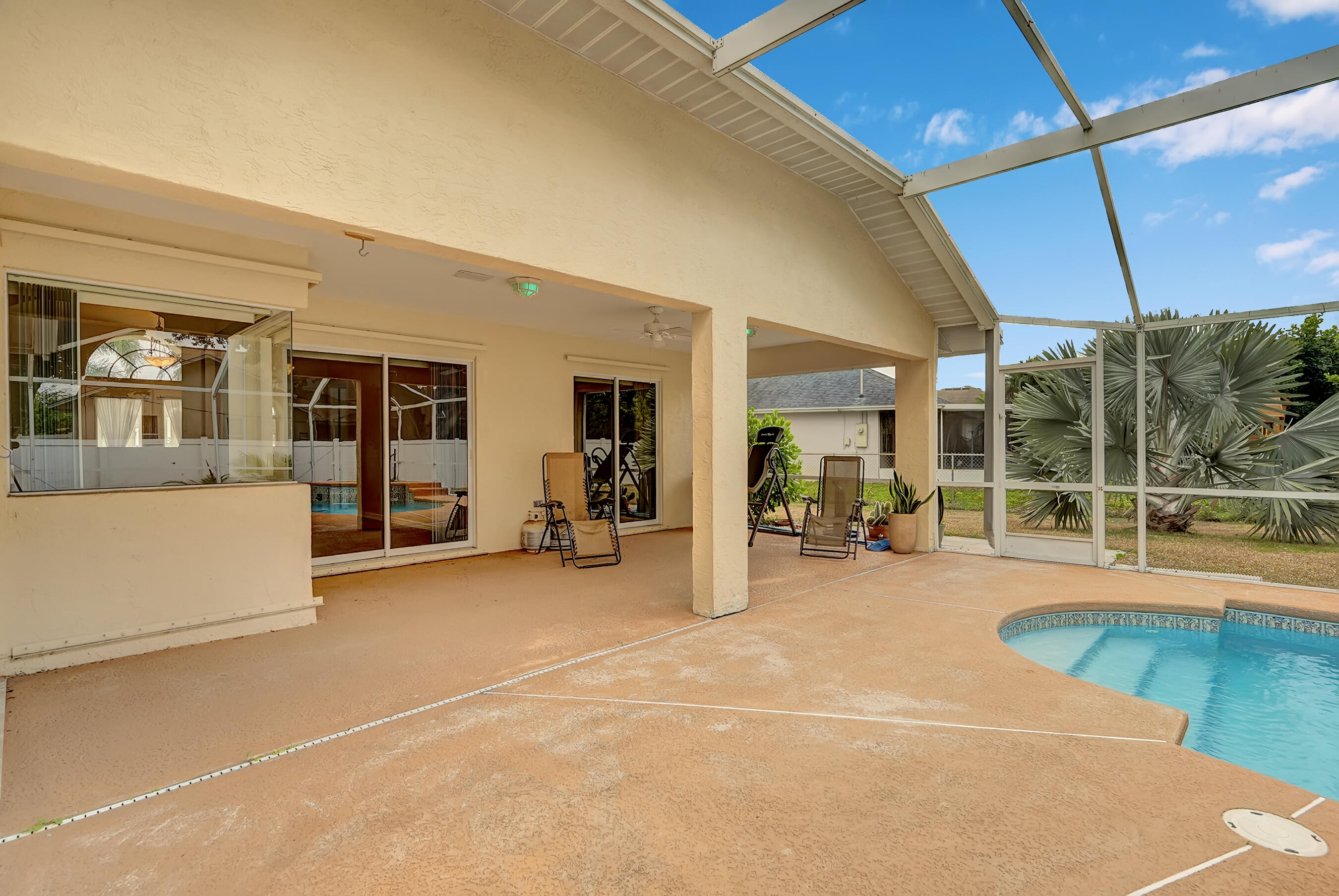 513 Southeast Cliff Road Port St. Lucie, FL 34984 - Photo 37 of 39 a view of a room with gym equipment