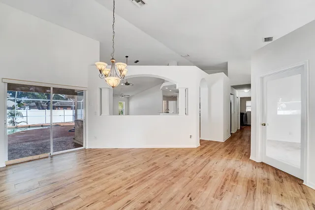 a view of a livingroom with wooden floor