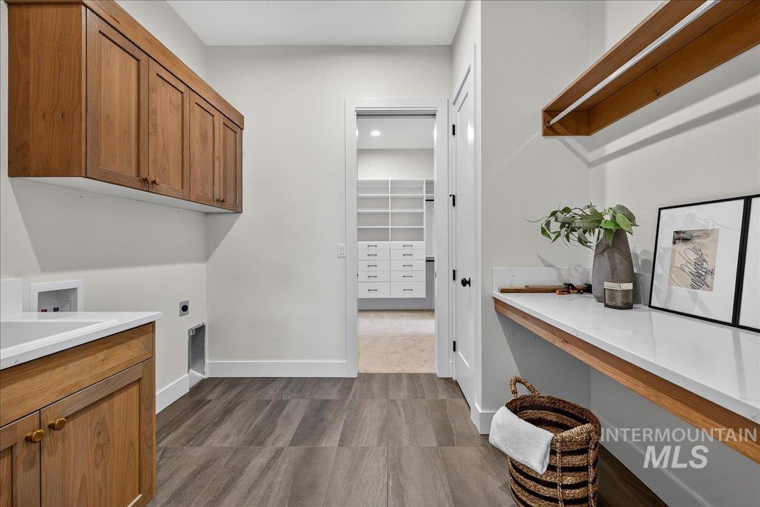 486 Joy Avenue Middleton, ID 83644 - Photo 27 of 36 Laundry area with cabinet space and hookup for an electric dryer