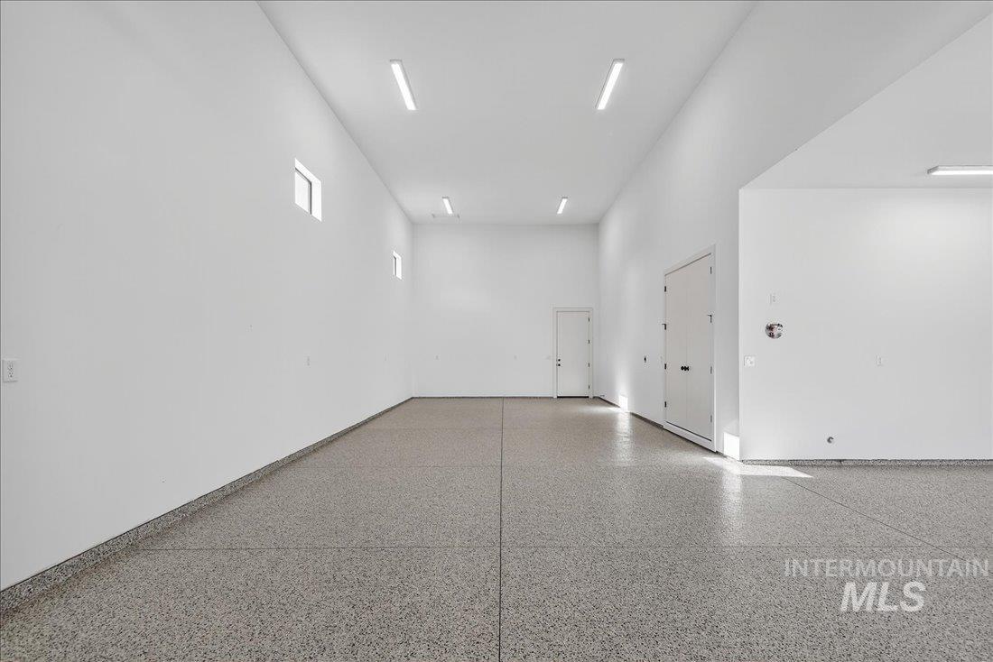 486 Joy Avenue Middleton, ID 83644 - Photo 28 of 36 Unfurnished room with a high ceiling and speckled floor
