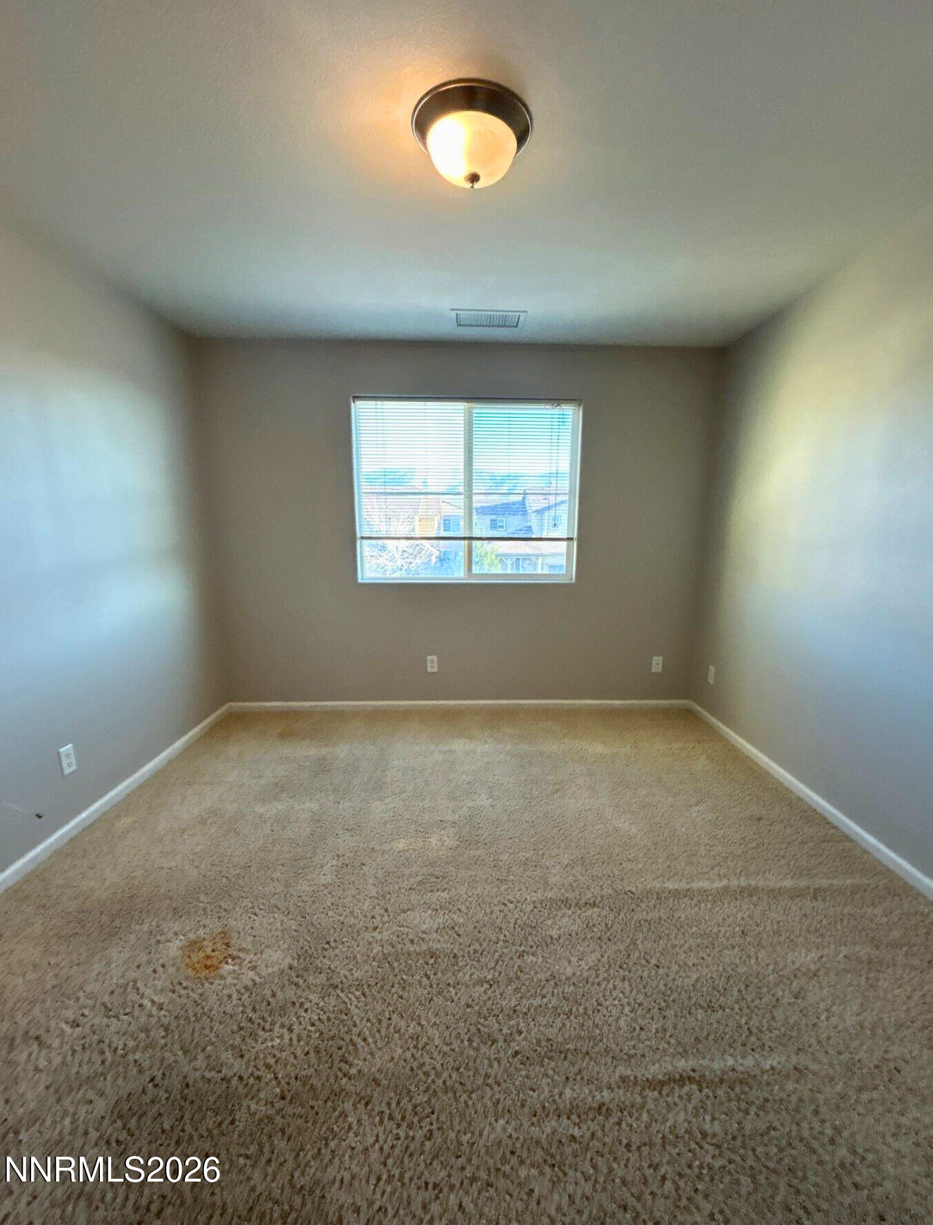 2035 Echo Valley Parkway Reno, NV 89521 - Photo 13 of 16 an empty room with a window
