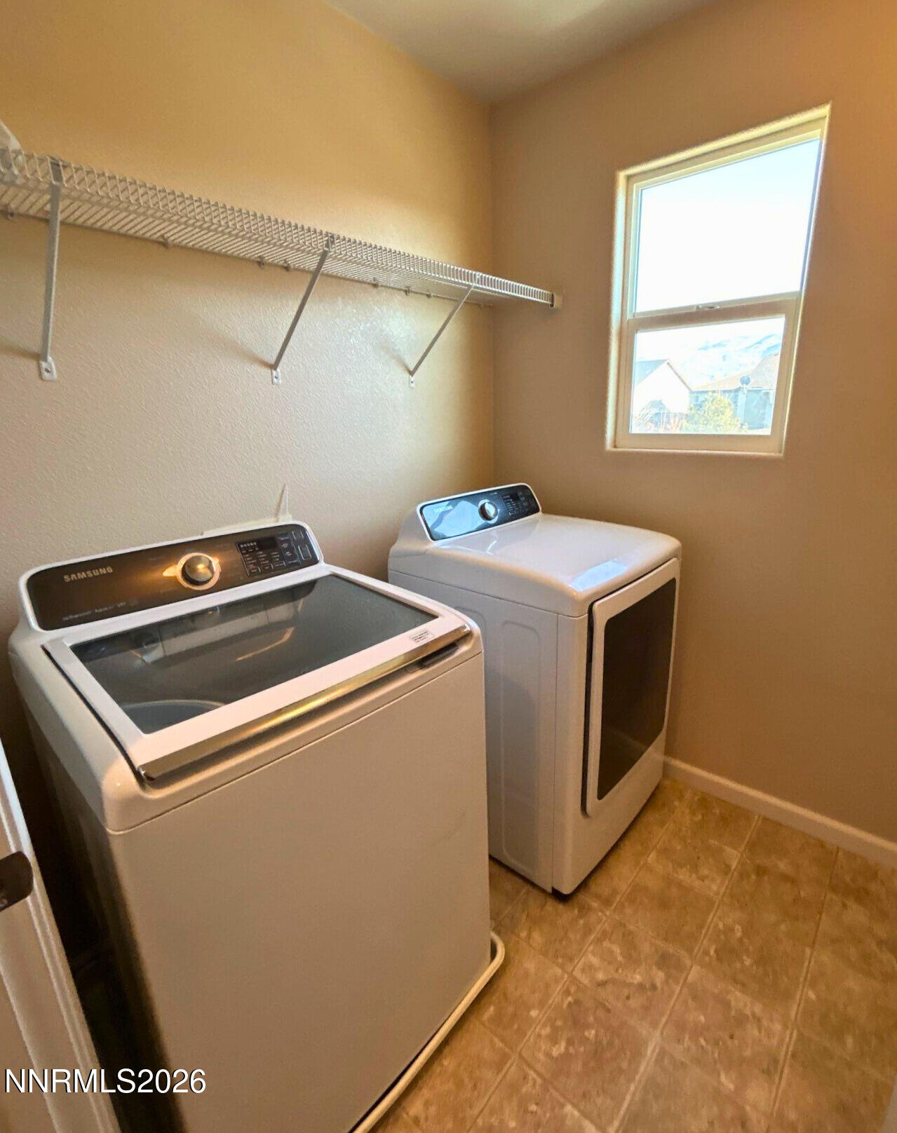 2035 Echo Valley Parkway Reno, NV 89521 - Photo 16 of 16 a utility room with dryer and washer