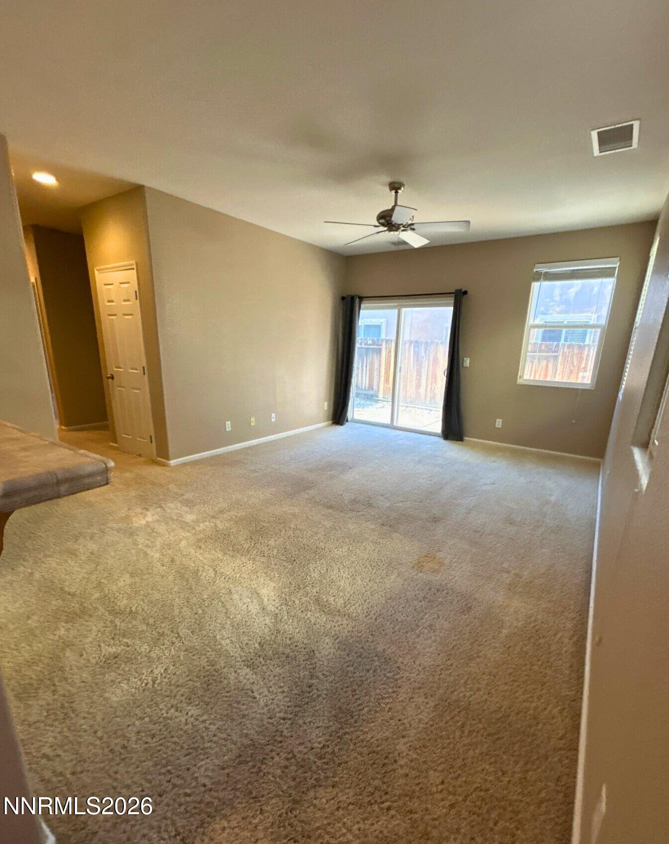 2035 Echo Valley Parkway Reno, NV 89521 - Photo 5 of 16 a view of an empty room with a window