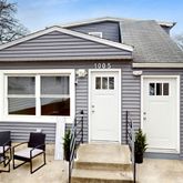 a front view of a house with a porch