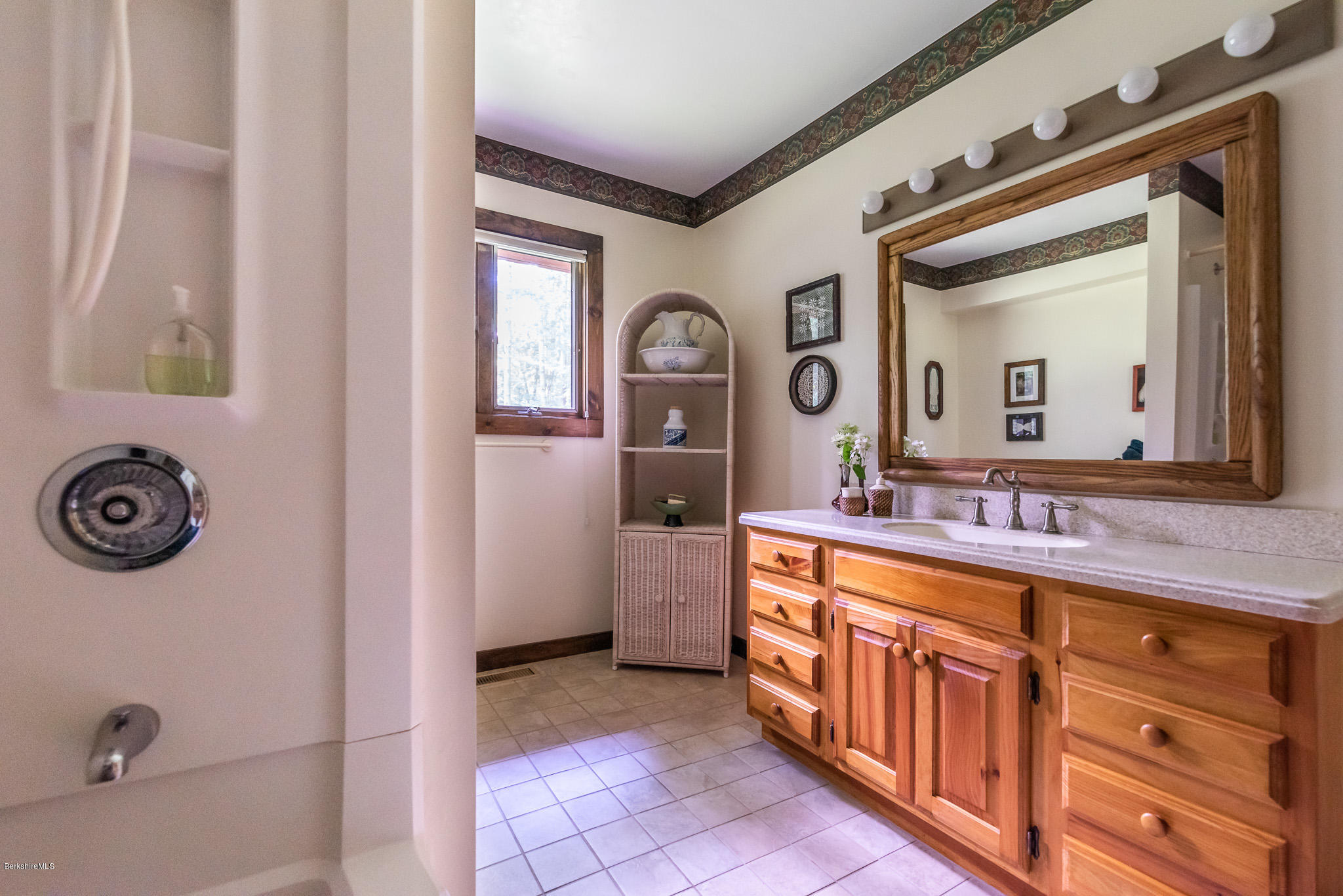 811 Salisbury Road Sheffield, MA 01257 - Photo 16 of 39 a large bathroom with a mirror a sink and a mirror