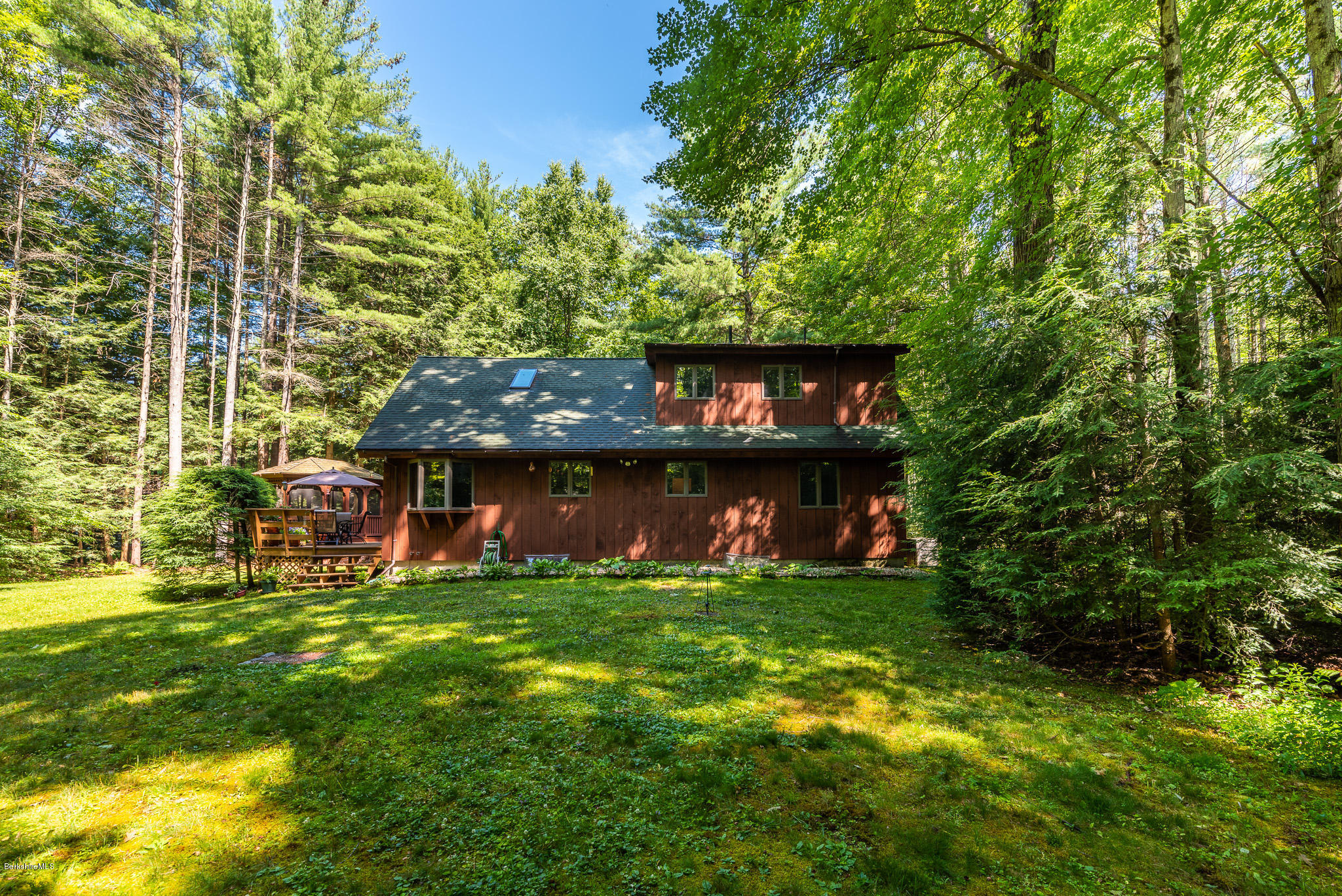 811 Salisbury Road Sheffield, MA 01257 - Photo 24 of 39 a view of a brick house with a yard