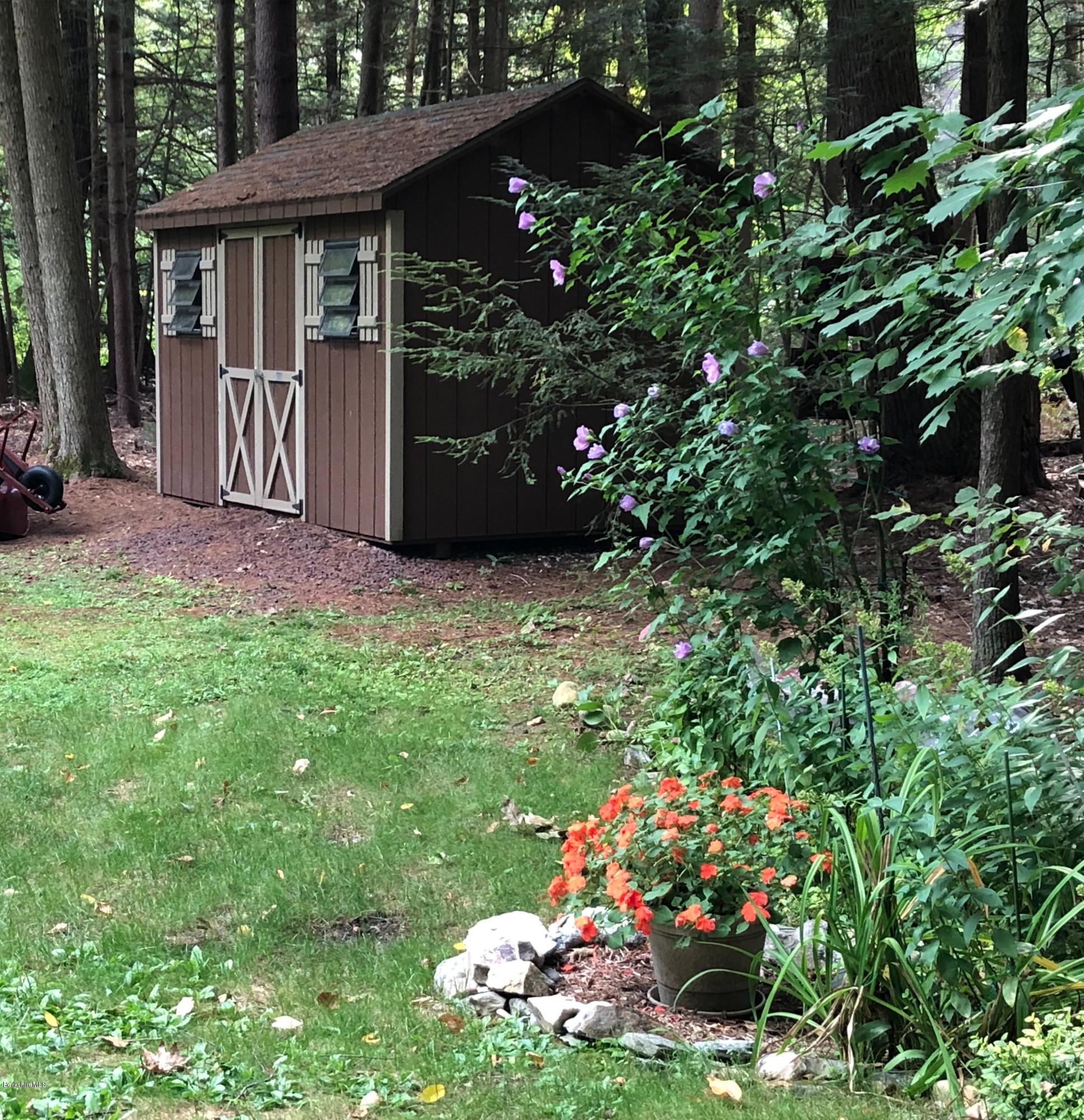 811 Salisbury Road Sheffield, MA 01257 - Photo 29 of 39 a front view of a house with a yard