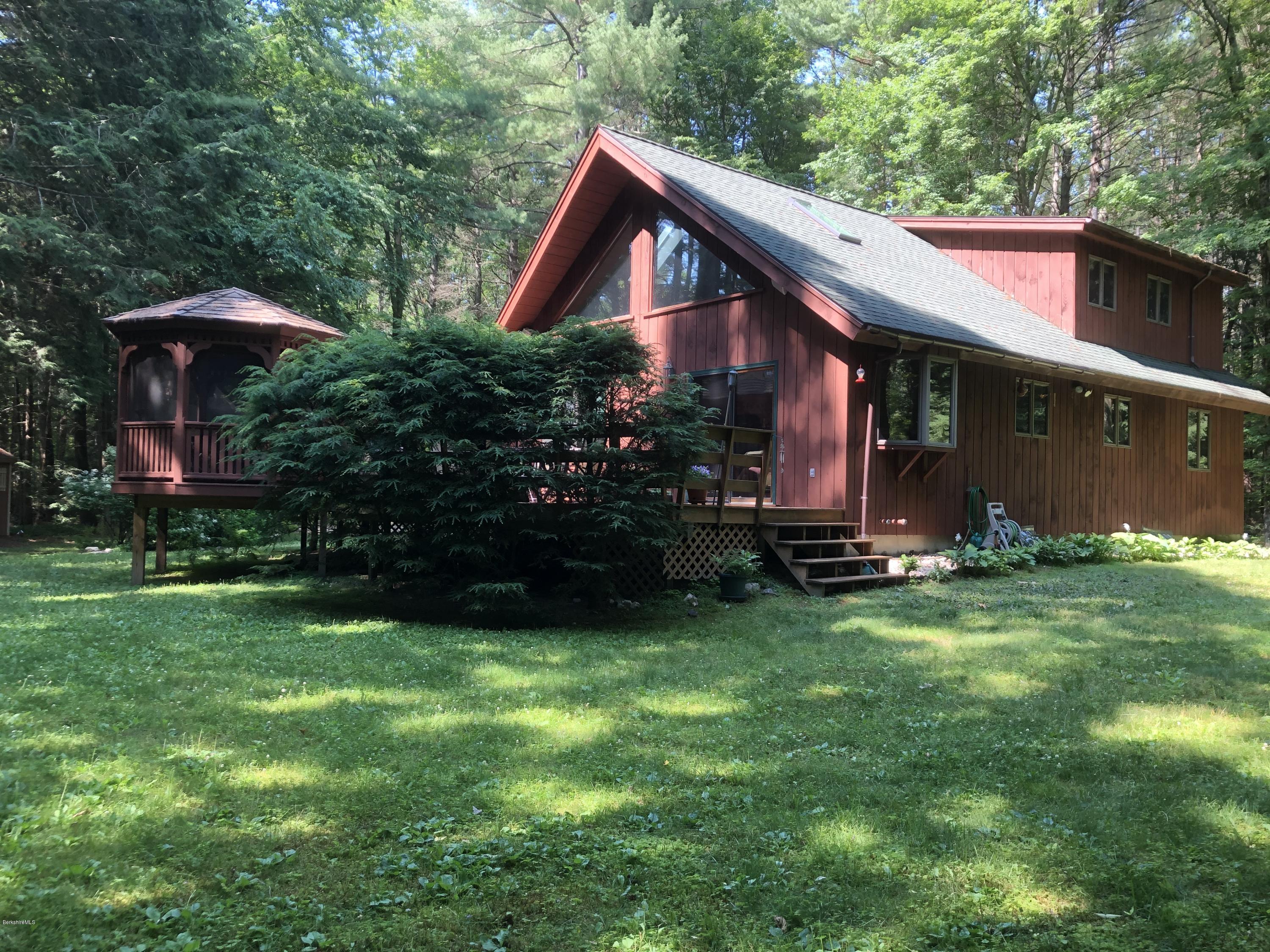 811 Salisbury Road Sheffield, MA 01257 - Photo 30 of 39 a front view of house with yard and outdoor seating