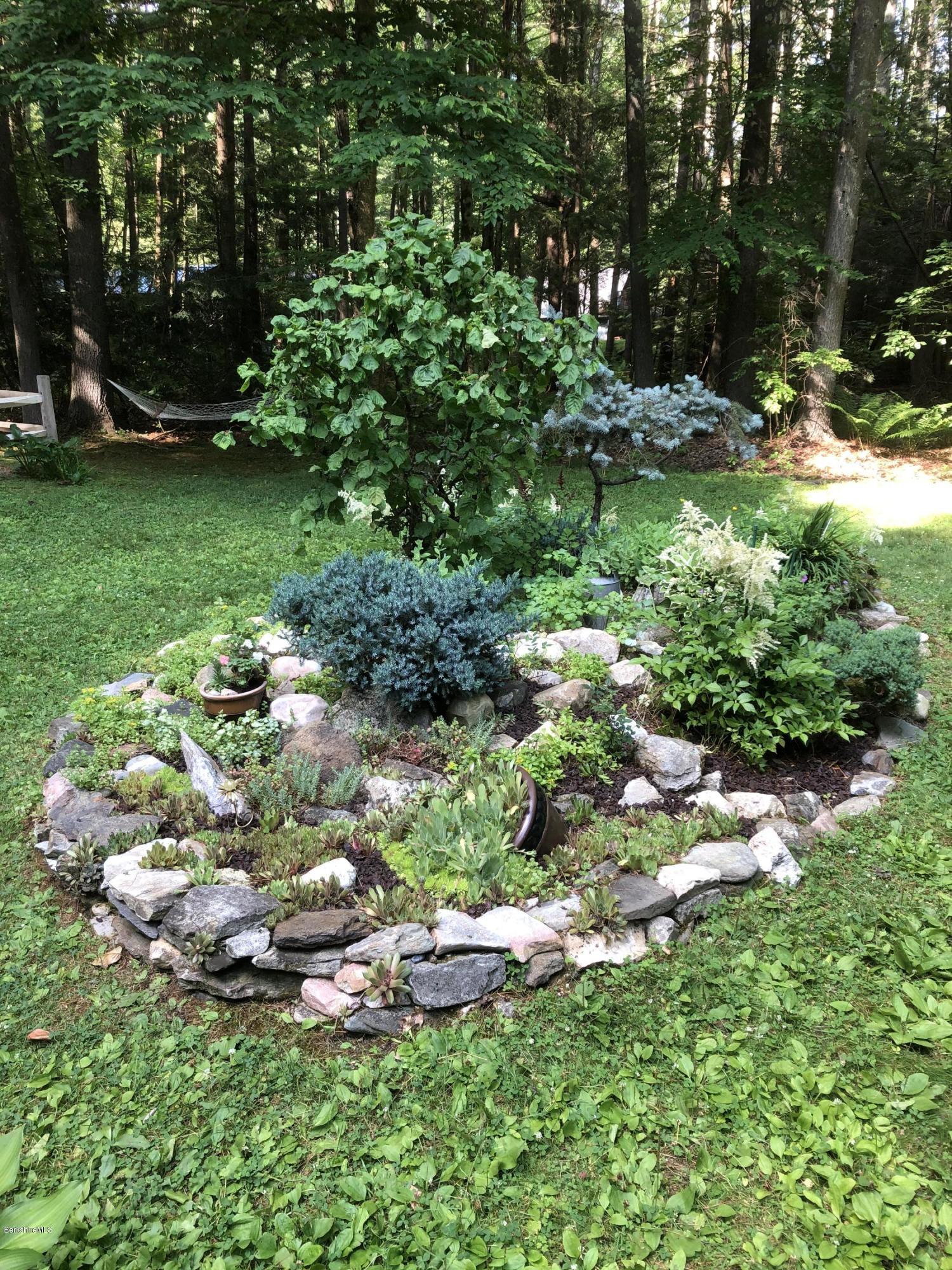 811 Salisbury Road Sheffield, MA 01257 - Photo 34 of 39 a garden with lots of trees and flowers