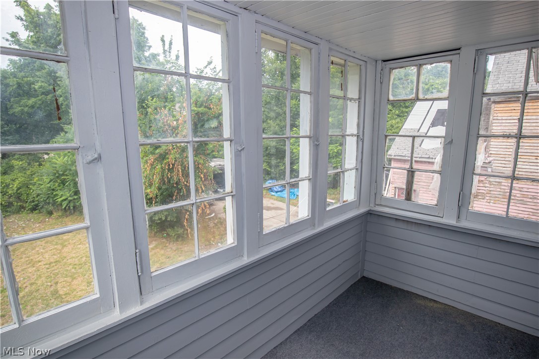 9505 Aetna Road Cleveland, OH 44105 - Photo 17 of 25 Unfurnished sunroom with a healthy amount of sunlight