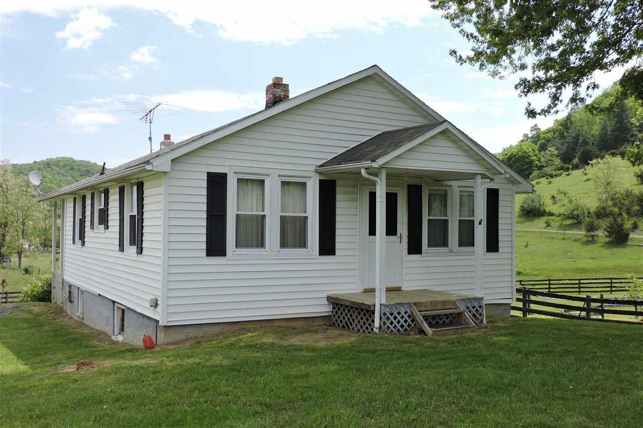 937 Cales Springs Road Middlebrook, VA 24459 - Photo 21 of 27 a view of a house with a backyard