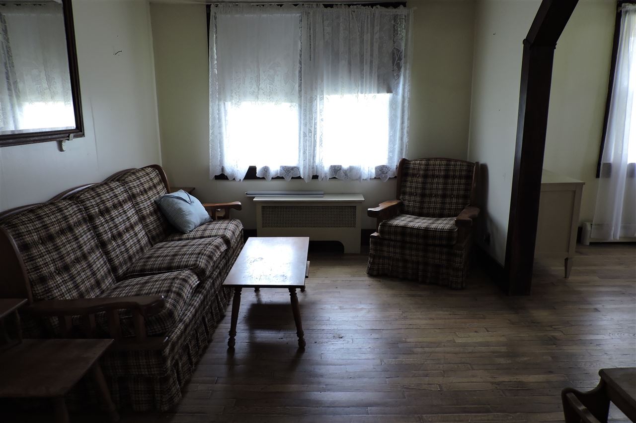 937 Cales Springs Road Middlebrook, VA 24459 - Photo 23 of 27 a living room with furniture and a potted plant
