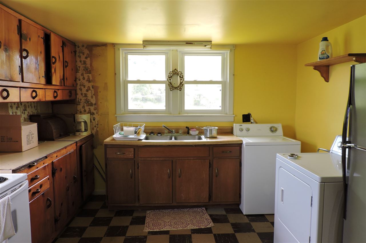 937 Cales Springs Road Middlebrook, VA 24459 - Photo 26 of 27 a bathroom with a sink and a washing machine