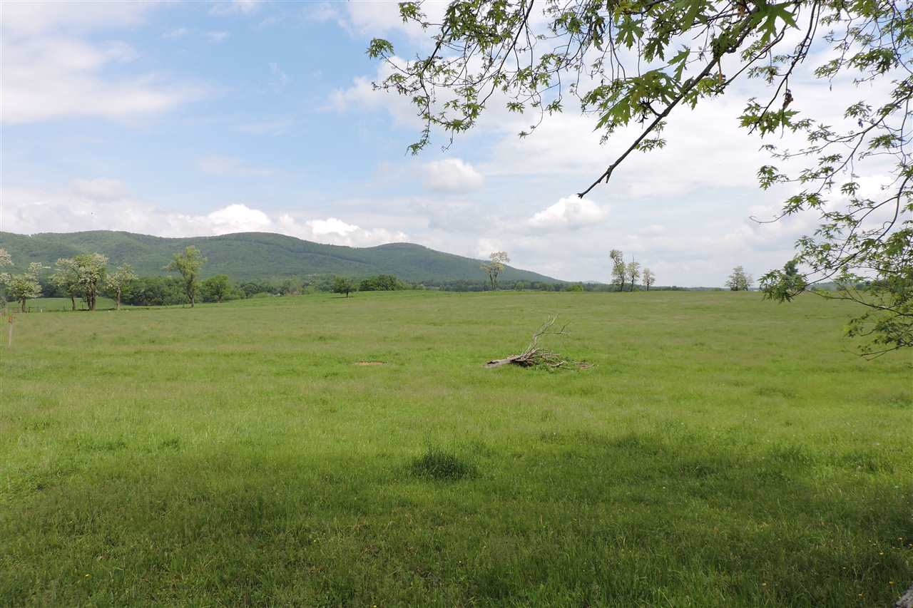 937 Cales Springs Road Middlebrook, VA 24459 - Photo 9 of 27 a view of a lake with a mountain in the background
