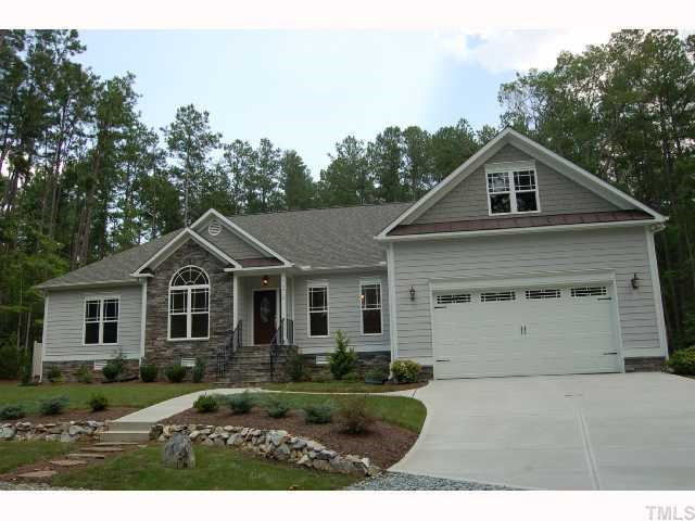 6912 Johnson Mill Road Bahama, NC 27503 - Photo 1 of 12 Beautifully crafted new custom home on a very private 4 acres, just inside Bahama off Maston Rd. Highest quality fiber cement siding, stone accent, beautiful landscaping with natural stone landscape wall. A pristine property.