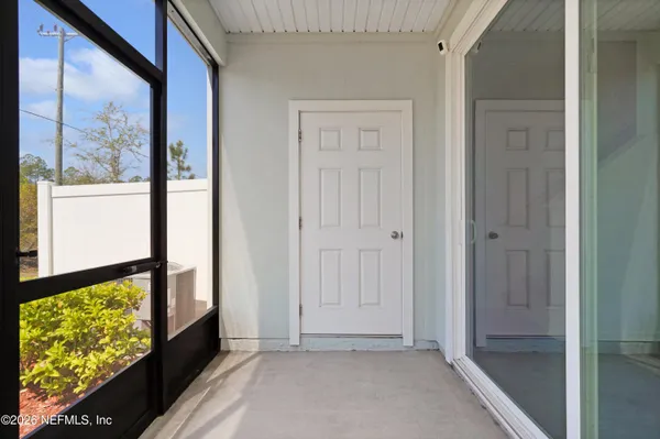 a front view of a house with a yard and porch