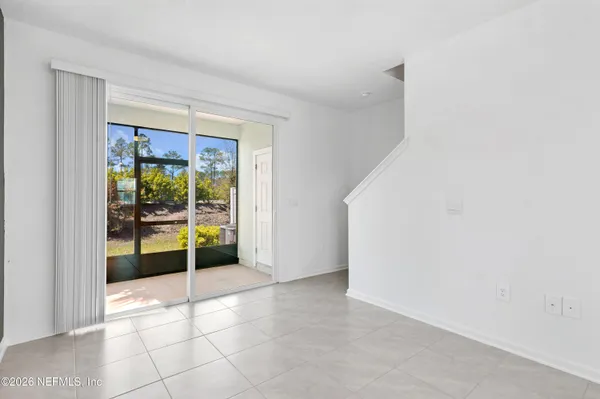 a view of an empty room with window