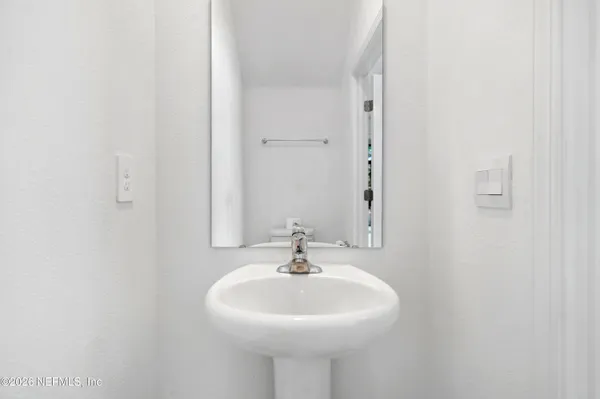 a sink with a mirror