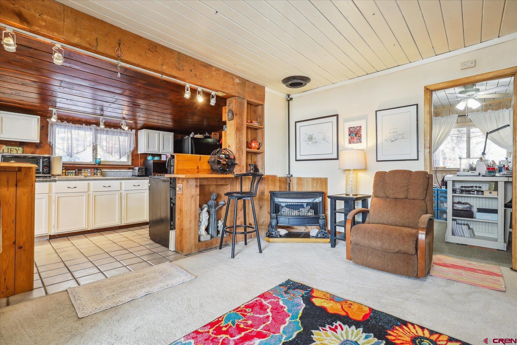 6815 County Road 203 Durango, CO 81301 - Photo 6 of 35 a living room with furniture and next to a window