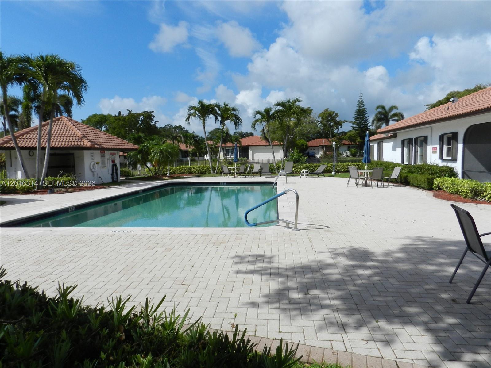 305 Northwest 42nd Street Boca Raton, FL 33431 - Photo 31 of 31 a view of house with outdoor space and sitting area