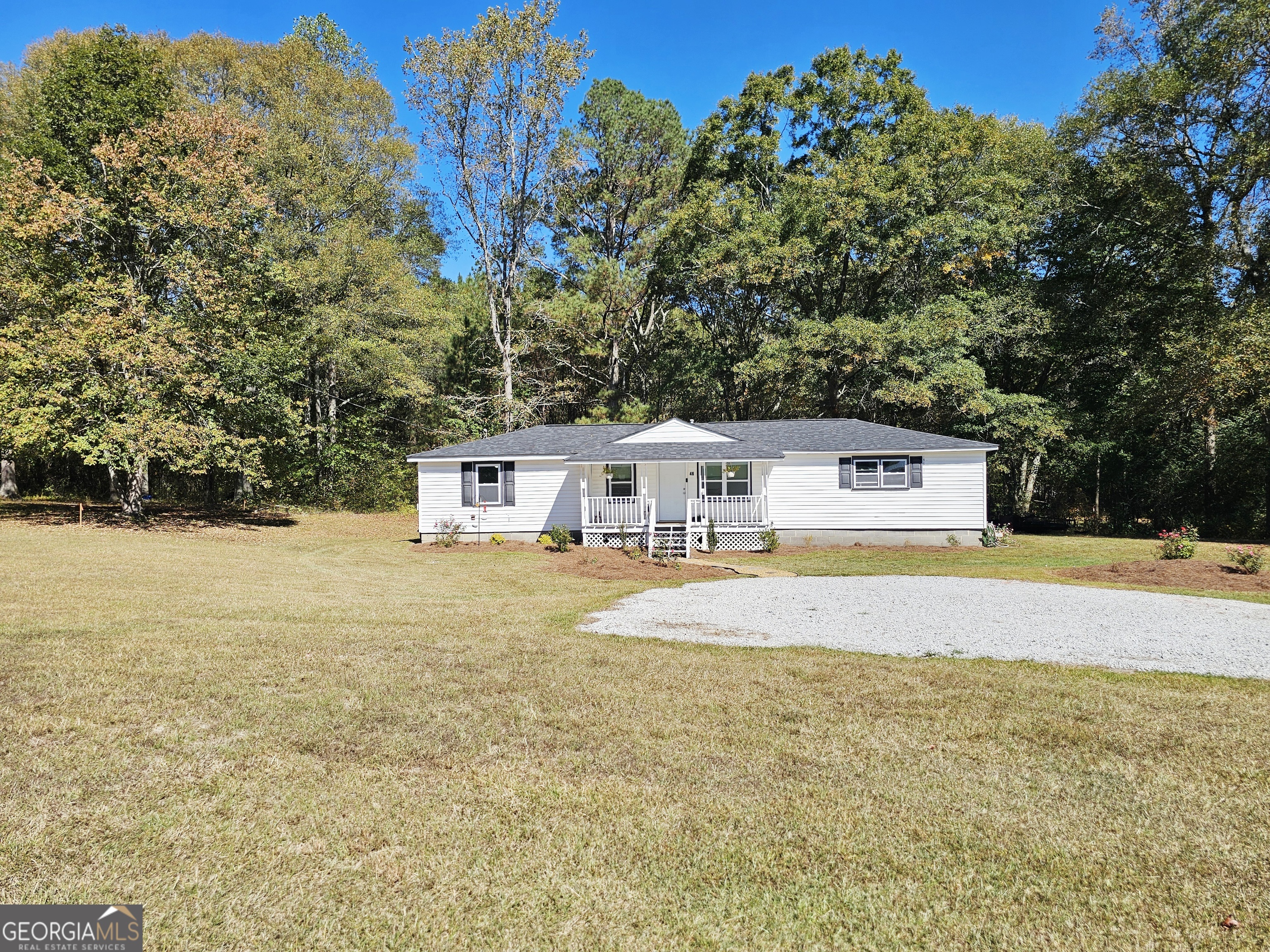 46 Gammon Road Carrollton, GA 30117 - Photo 17 of 17 a view of a house with swimming pool